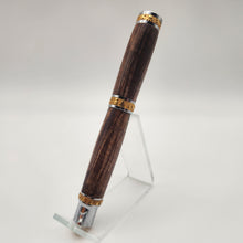 Load image into Gallery viewer, Chrome and gold Pharaoh rollerball in stabilized curly maple
