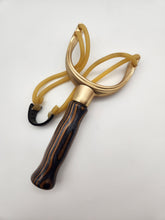Load image into Gallery viewer, Brass slingshot in brown & charcoal wood laminate
