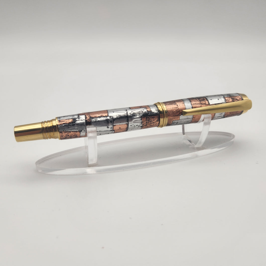 Solid brass steampunk themed rollerball pen.