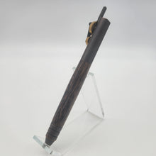 Load image into Gallery viewer, Oil rubbed bronze and brass piston pen in stabilized black palm
