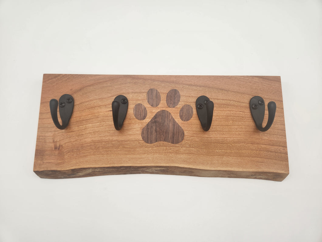 Key rack with dog paw print inlay