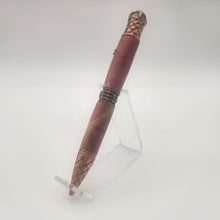Load image into Gallery viewer, Antique copper Dragon twist pen in red dyed and stabilized curly maple
