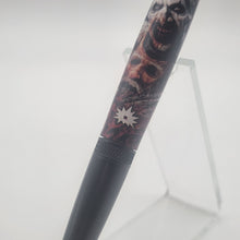 Load image into Gallery viewer, Art the Clown twist pen with Christmas ornament embed.
