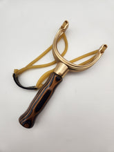 Load image into Gallery viewer, Brass slingshot in brown &amp; charcoal wood laminate
